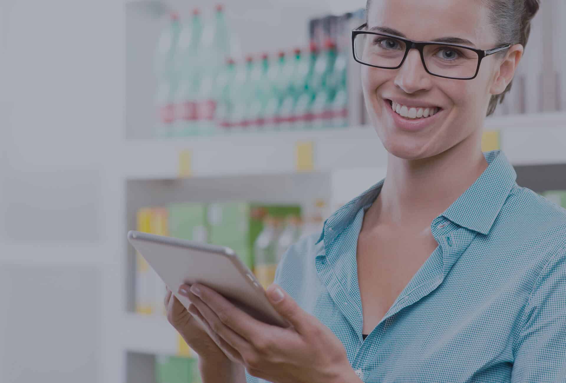 woman holding tablet using sales force automation SFA